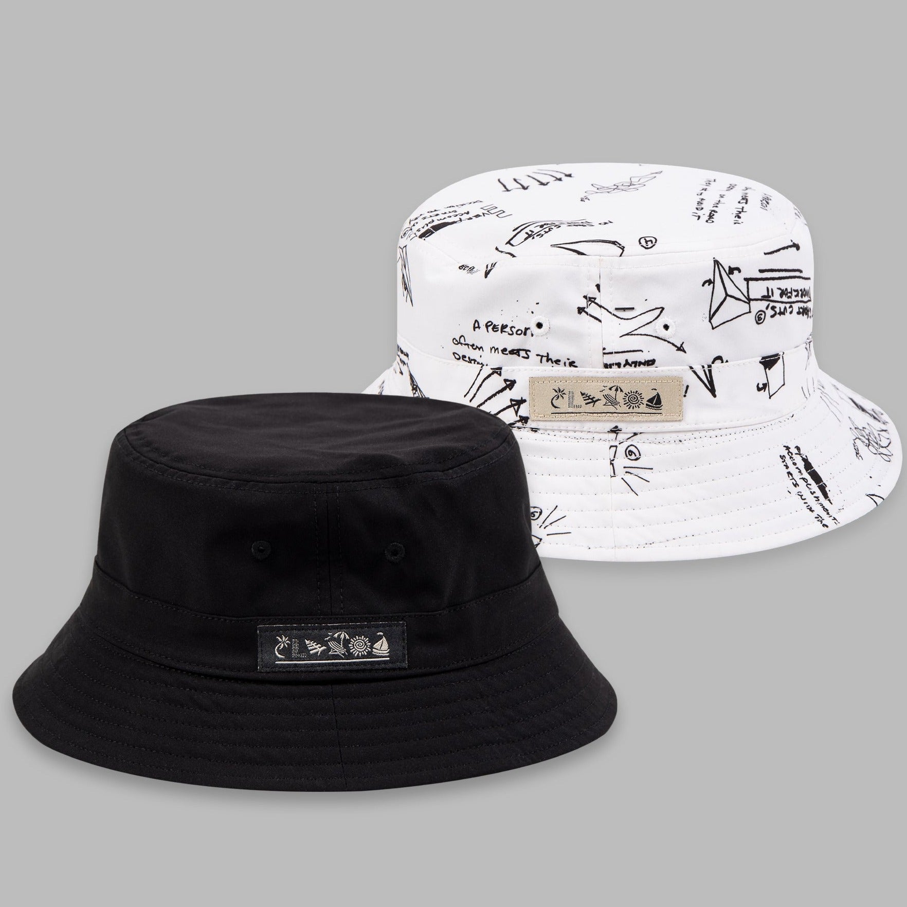PAPER PLANE - REVERSIBLE BUCKET HAT - BLACK